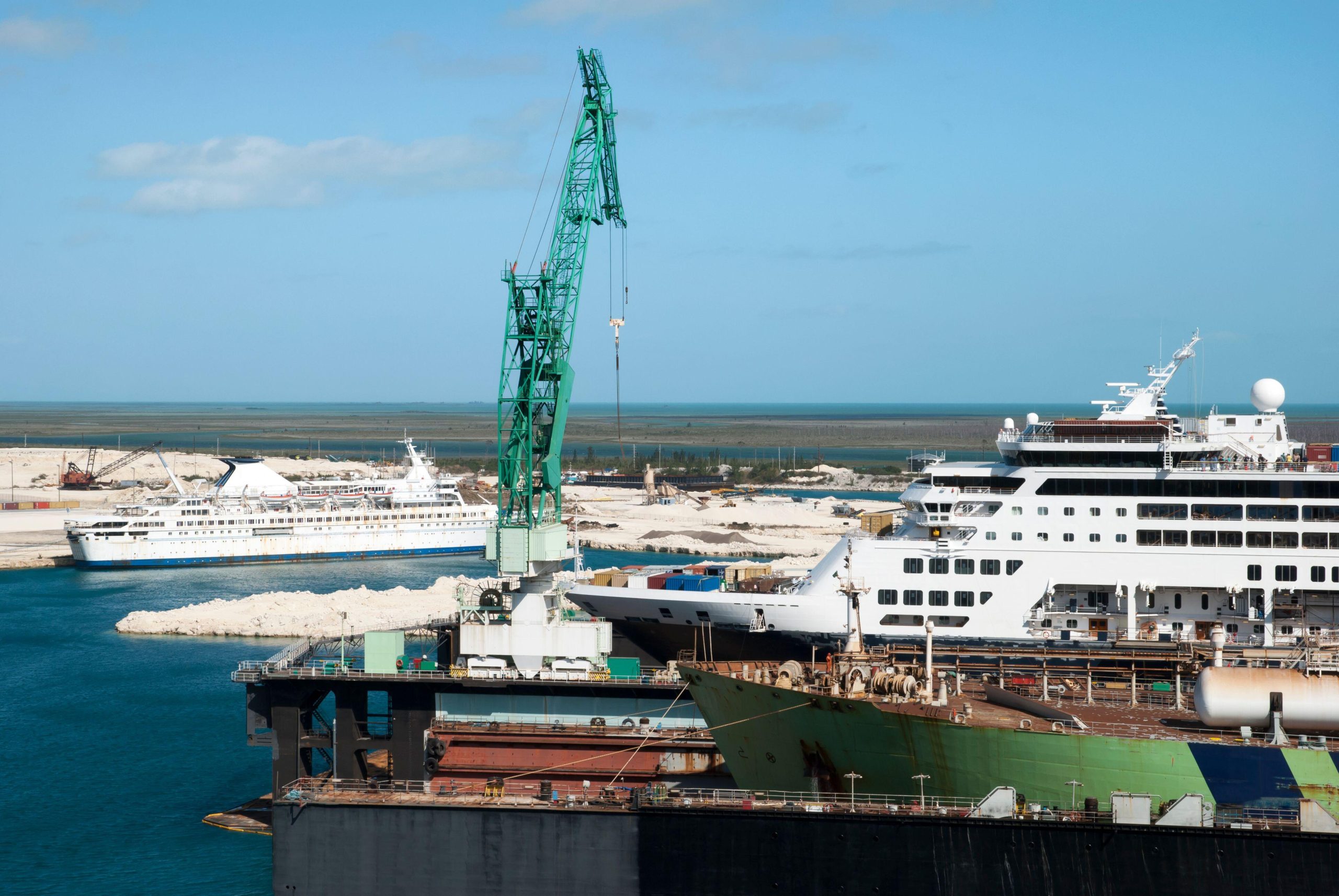 The cargo and a cruise ships inside Freeport dry dock on Grand Bahama Island (Bahamas).