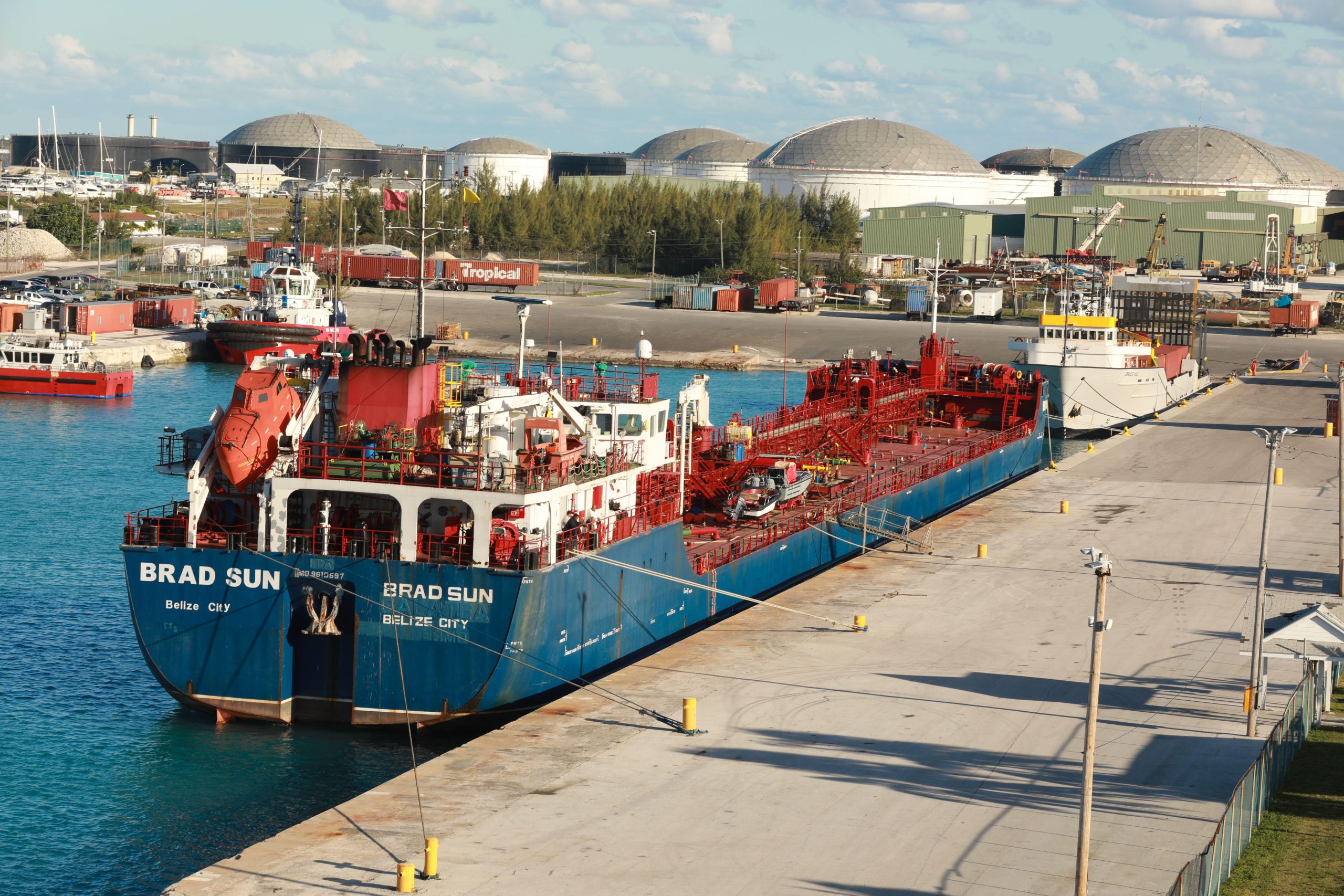 Port of Freeport Bahamas Container shipyard with heavy lifting Cranes and a ship waiting to off load its cargo