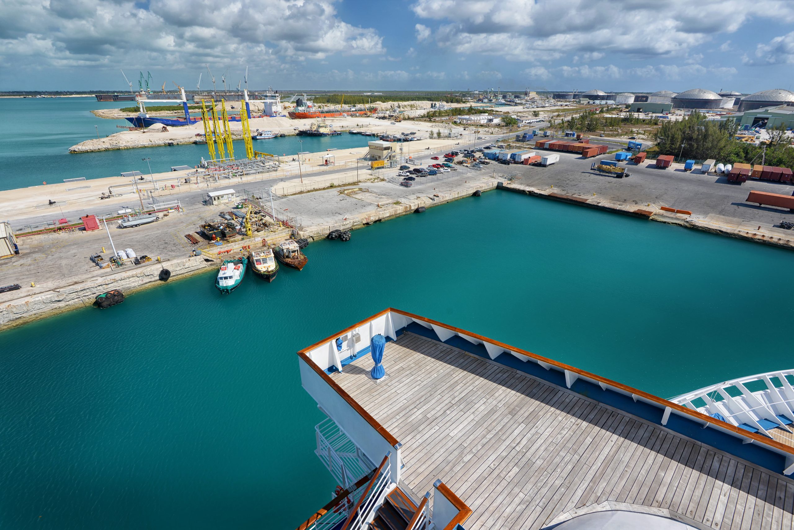 Industrial harbour Freeport berthing, cargo load discharge, customs cleariing